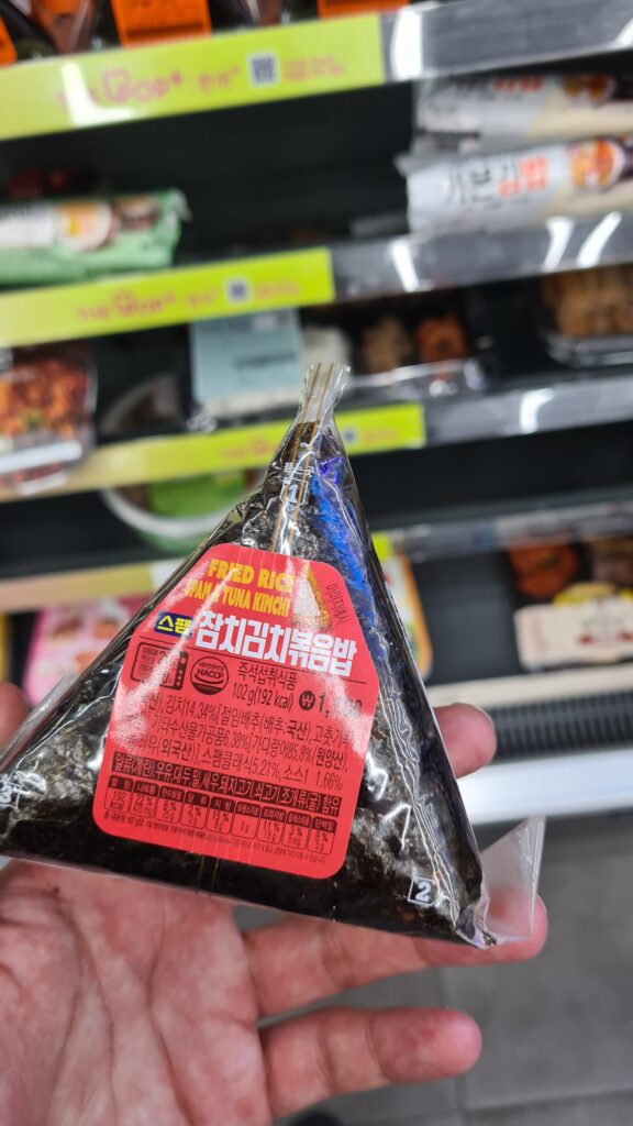 Gimbap in a hand in a convenience store
