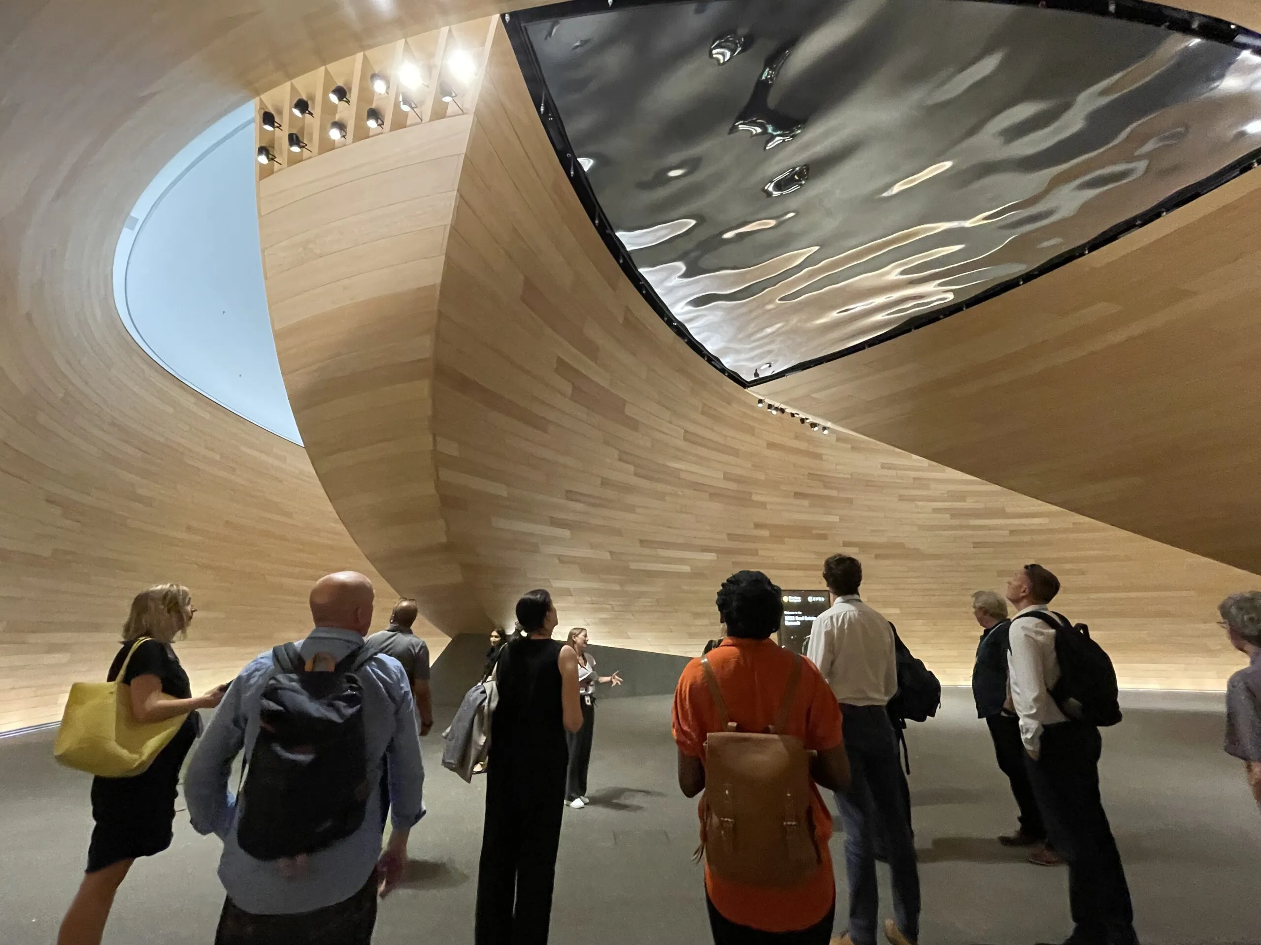 Tour attendees in the 'vortex' entrance at Bloomberg