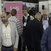 London networking session hosted by LOTI at SCEWC A photo of various people in conversation with each other